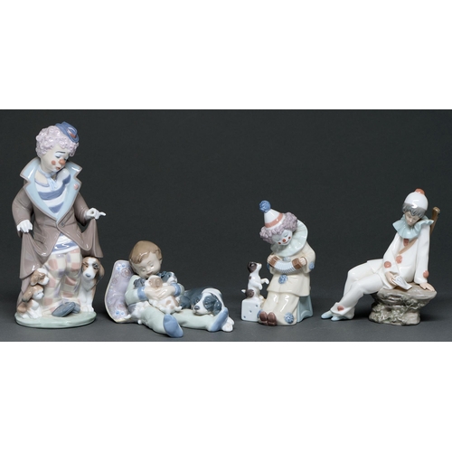 558 - Two Lladro figures of clowns and another of a sleeping boy, various sizes, printed marks and a Nao f... 