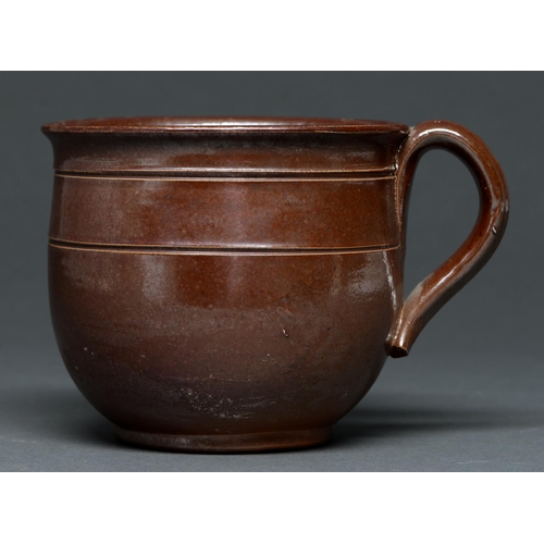 564 - A Derbyshire saltglazed brown stoneware handled pot or porringer, Brampton or Chesterfield, late 18t... 