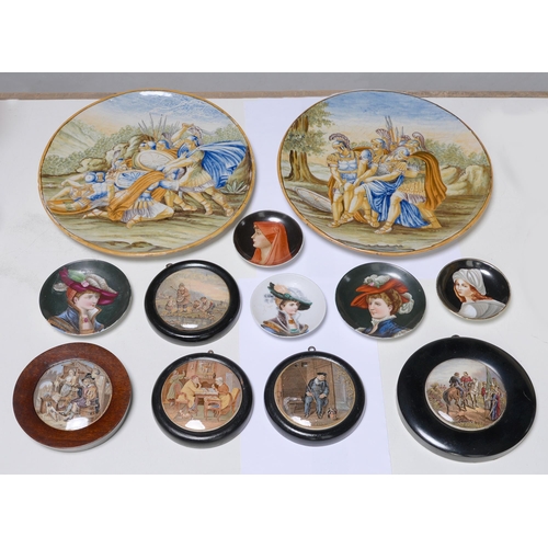 567 - A pair of Italian maiolica istoriato dishes, late 19th c, painted in 16th c style, 32cm diam, one pa... 