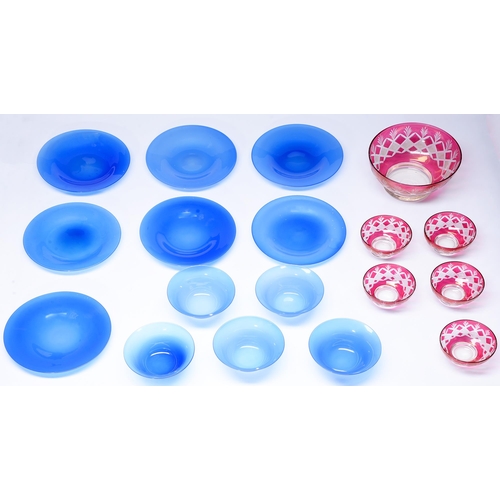 578A - A set of five semi opaque blue glass finger bowls and seven plates, c1930, plates 20cm diam and a cr... 