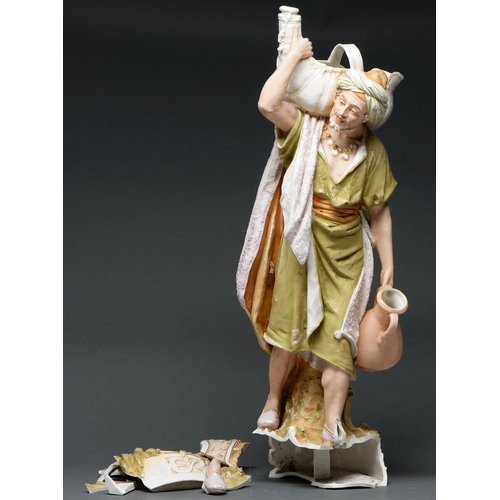 601 - A Royal Dux figure of an Eastern water carrier, early 20th c, 66cm h