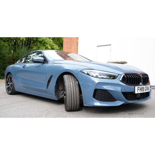 617 - Motor Car. Exceptionally low mileage 2019 (May) BMW 840D X Drive, two door, blue with cream interior... 