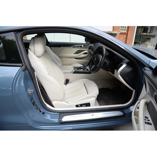 617 - Motor Car. Exceptionally low mileage 2019 (May) BMW 840D X Drive, two door, blue with cream interior... 