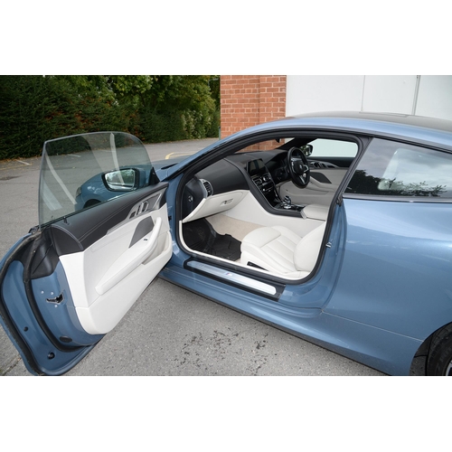 617 - Motor Car. Exceptionally low mileage 2019 (May) BMW 840D X Drive, two door, blue with cream interior... 