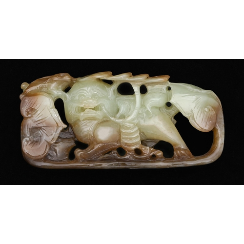 650 - A Chinese jade pebble carving of a dog of Fo, 12cm l