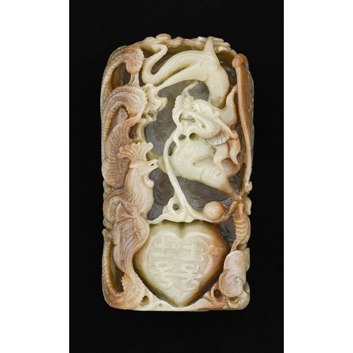 654 - A Chinese jade boulder carving of phoenix and dragon with heart and shou, 14cm h