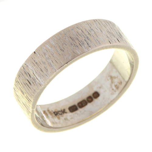 69 - An 18ct white gold ring, bark textured, London 1968, 6.2g, size N