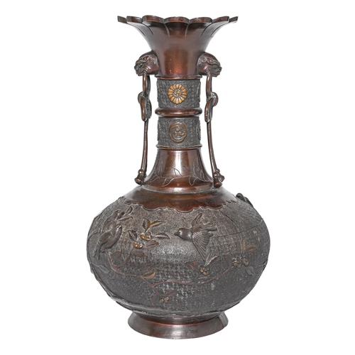 705 - A Japanese bronze vase, Meiji period, with mask and knotted cord handles, russet patina, 46cm h... 