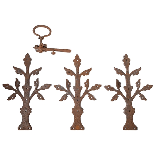 728 - A set of three wrought iron foliate hinges and a door latch, hinges 43cm l