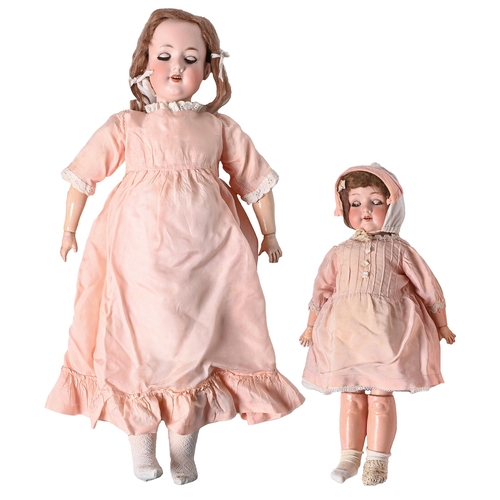 729 - Two composition character dolls, early 20th c, with Armand Marseille bisque head, 60cm h and smaller... 