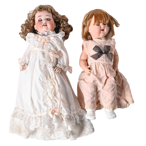 732 - Two composition character dolls with Armand Marseille bisque head, early 20th c, 52cm h and smaller... 