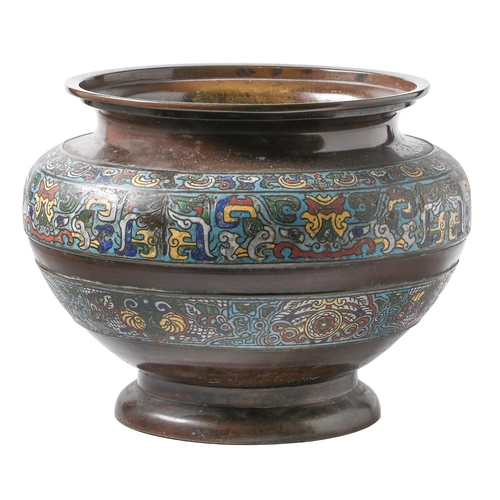 745 - A Chinese bronze and champleve enamel jardiniere, c1900, decorated with taotie in two bands on a gro... 