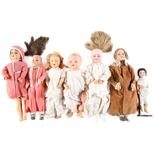 758 - Seven various bisque and other head character dolls, first half 20th c, mostly with jointed composit... 