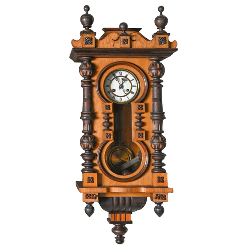 785 - A German walnut and ebonised Vienna wall clock, c1900, with enamel dial and gridiron pendulum, 87cm ... 