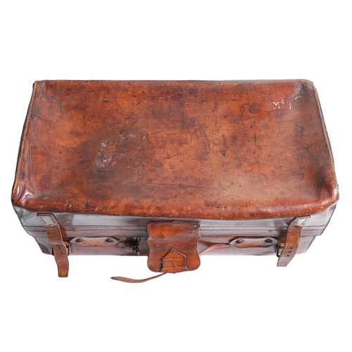 788 - Vintage luggage. A substantial leather suitcase, early 20th c, the brass lock beneath leather flap f... 