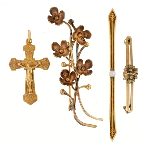 91 - A French gold crucifix, 30mm h, tete d'aigle control mark  and three gold brooches, 13.4g (4)... 