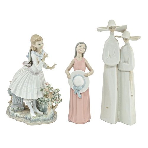 12 - Two Lladro figures of young women and a group, 33cm h and smaller, printed mark
