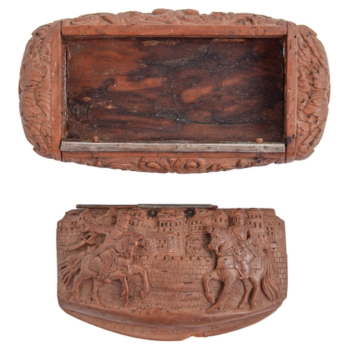 161 - Treen. A coquilla nut snuff box, 19th c,  the lid carved with the mounted figures of Napoleon and an... 