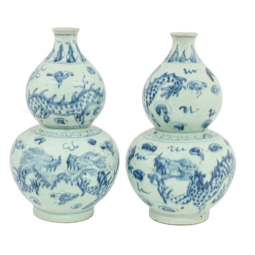 6 - A pair of Chinese blue and white double gourd  dragon vases, 20th c, 38cm h
