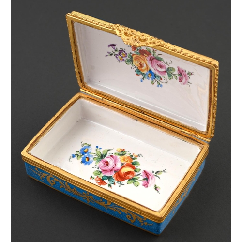 71 - A giltmetal mounted Limoges box, 20th c, painted with lovers beneath a tree reserved on a bleu celes... 