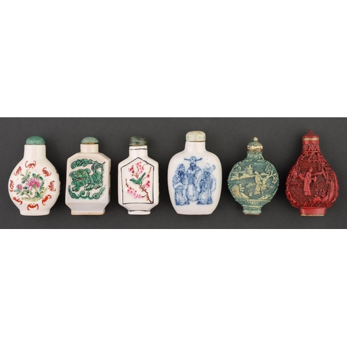 75 - Five Chinese famille rose and blue and white snuff bottles and a cinnabar lacquer example, 20th c,  ... 