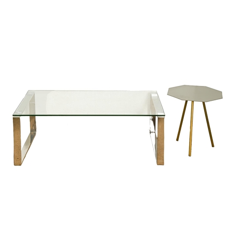 774 - An occasional table, the rectangular plate glass top on polished metal end supports, 60 x 110cm and ... 