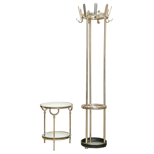 779 - A cast alloy hat stand, on round metal base, 189cm h and a circular polished metal and mirror inset ... 