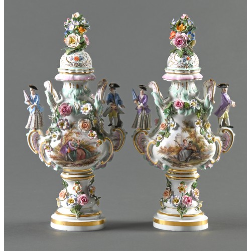 3 - A pair of Meissen floral encrusted vases and covers, late 19th c, with diminutive figure handles in ... 