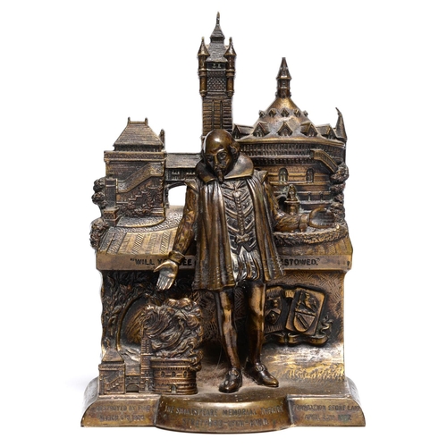 1032 - A brass statuette of William Shakespeare standing before the burning ruins of the memorial theatre S... 