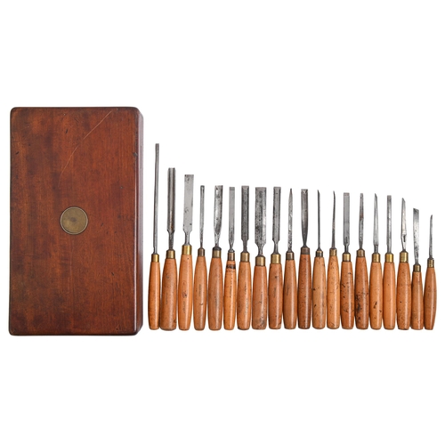 1049 - Twenty chisels and carving gouges, with boxwood handle, in a 19th c mahogany box, 21 x 38cm... 