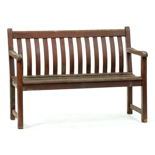 1198 - A stained wood garden seat, 122cm l