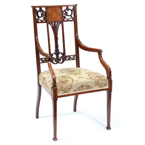 1248 - An Edwardian mahogany and inlaid armchair,  with carved and pierced splat to the curved back, swept ... 