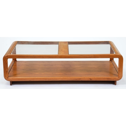 1273 - An Ercol ash coffee table, with plate glass top, 40cm h; 68 x 140cm