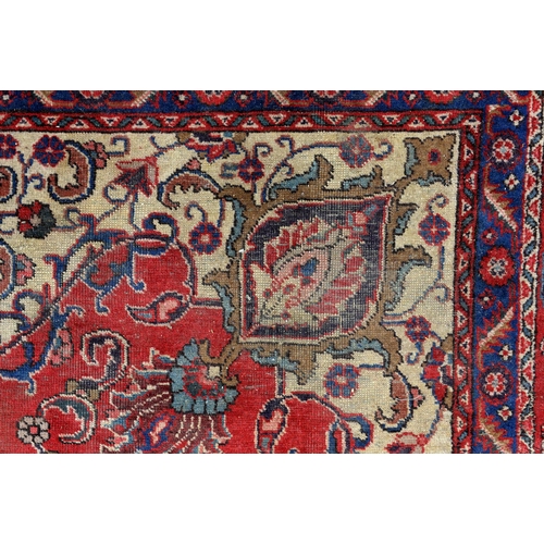 1291 - A red ground rug, 230 x 328cm