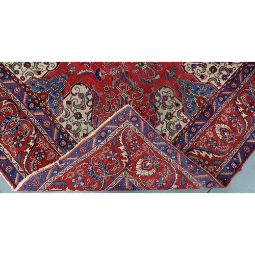 1291 - A red ground rug, 230 x 328cm