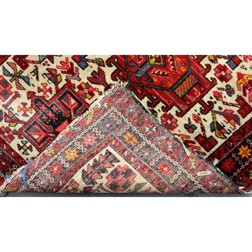 1345 - An antique rug, 106 x 130cm and another, 130 x 180cm (2)