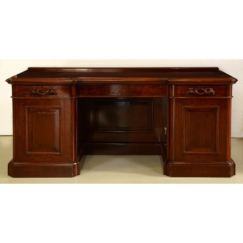 1350 - A Victorian stained oak pedestal sideboard,  with carved  handles and panelled doors, 94cm h; 70 x 2... 