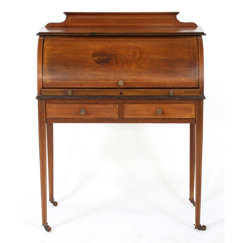 1357 - An inlaid mahogany cylinder top writing desk, early 20th c, with fitted interior, on square tapering... 