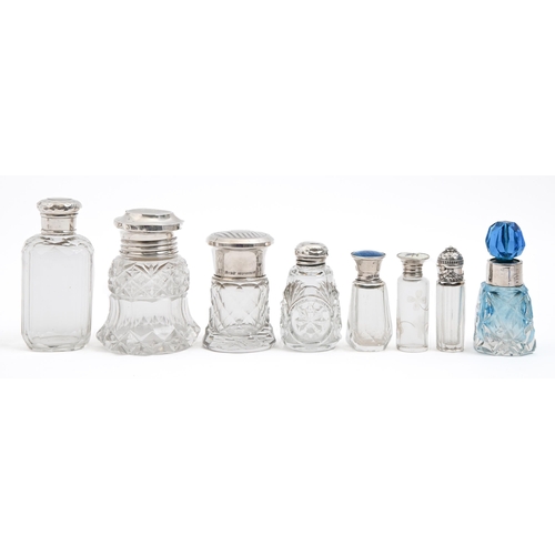 392 - Eight Victorian and early 20th c silver capped or mounted cut or faceted glass scent bottles, variou... 