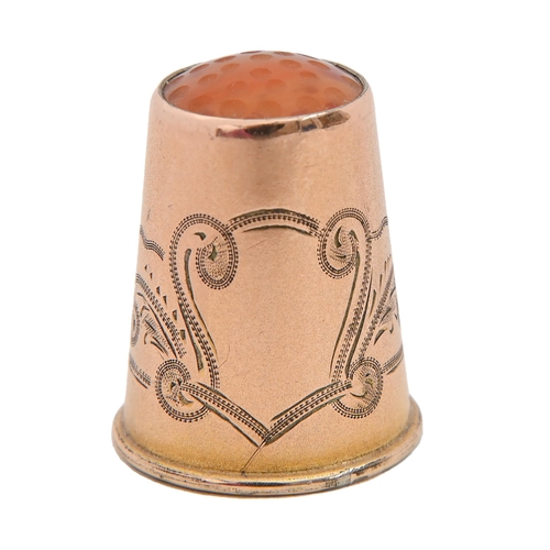 399 - A Swedish gold thimble, early 19th c,  with amber top, by Gustav Dahlberg of Stockholm,  in contempo... 