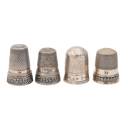 411 - Three Continental silver thimbles, 19th c, 25mm h and smaller, 9.6dwts and a contemporary nickel bra... 