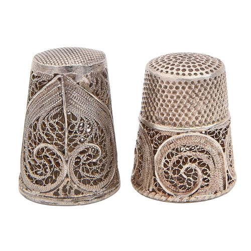 420 - Two Portuguese silver filigree thimbles, 24mm, control marks, one import marked Birmingham 1991, 6.7... 