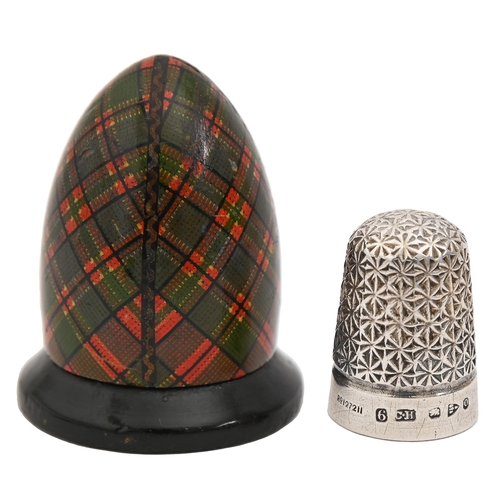 426 - A Scottish Victorian tartan ware thimble box and cover, egg shaped, 48mm h and a silver thimble, Lou... 