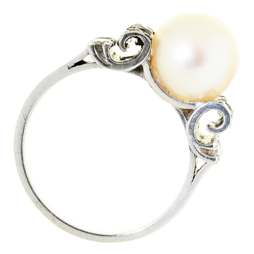 43 - A cultured pearl and diamond ring, in platinum, unmarked, 5.4g, size J½