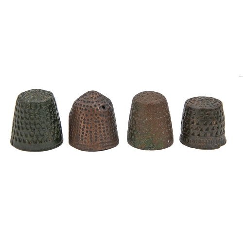 431 - Four European brass thimbles, 15th-17th c, 21mm h and smaller