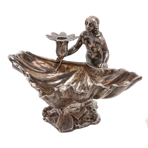 451 - A Victorian cast silver figural mermaid-and-shell taperstick,  with flower shaped nozzle, 85mm h, by... 