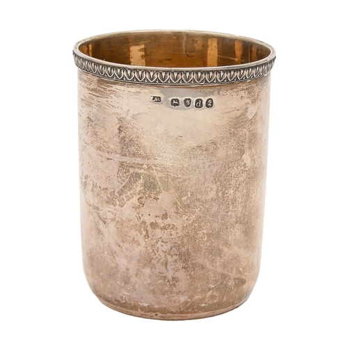 453 - A George III silver beaker, with applied egg-and-dart rim, interior gilt, 89mm h, maker's mark rubbe... 