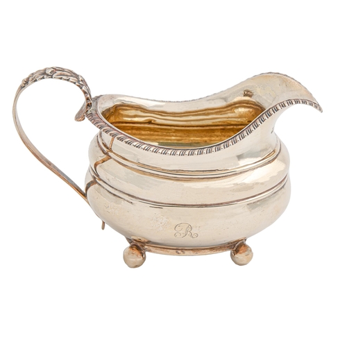 480 - A George IV silver cream jug, with gadrooned rim, on ball feet, 10cm,h by George Burrows, London 182... 