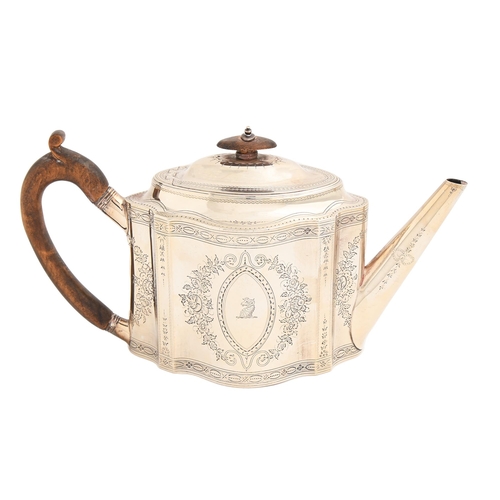 537 - A George III silver teapot, engraved with festoons, the domed lid with integral joint, crested, 14cm... 