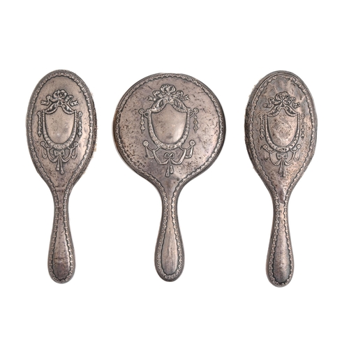 563 - A George V silver brush set, hand mirror 23cm l, by H Matthews, Birmingham 1916 (3)